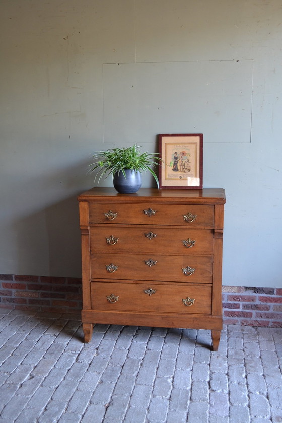 Image 1 of Commode Empire en chêne ancien.