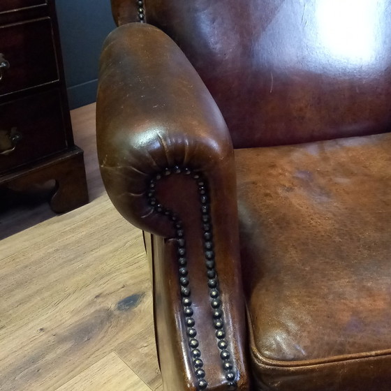 Image 1 of Fauteuil club intemporel en peau de mouton de style Art-Déco