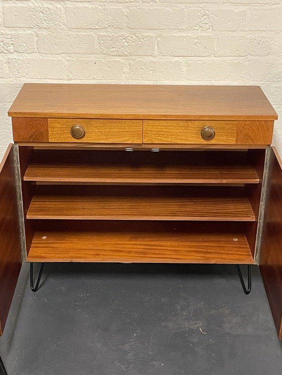 Image 1 of Armoire / commode, pieds en épingle à cheveux, boutons ronds. 1960'S