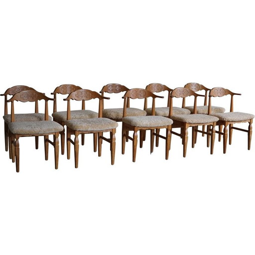 Ensemble de 10 chaises de salle à manger vintage en bois de chêne et rembourrées en laine d'agneau par Henning Kjærnulf, 1960s