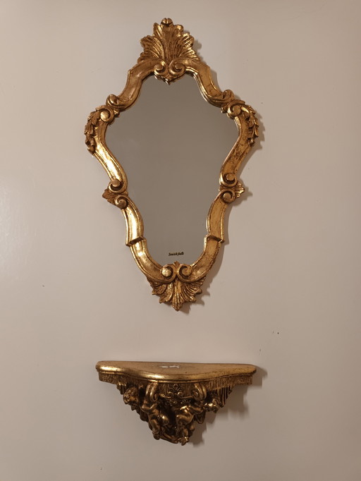 Miroir à cimier doré