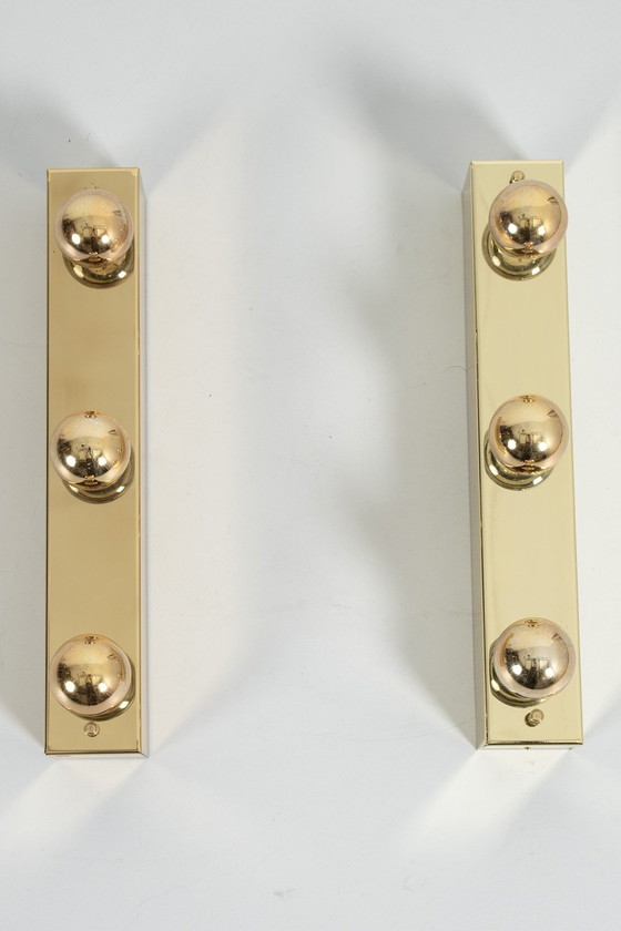 Image 1 of Ensemble de 2 lampes miroir en laiton