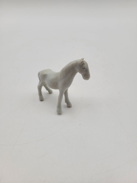 Image 1 of Ensemble De 6 Chevaux Anciens En Porcelaine