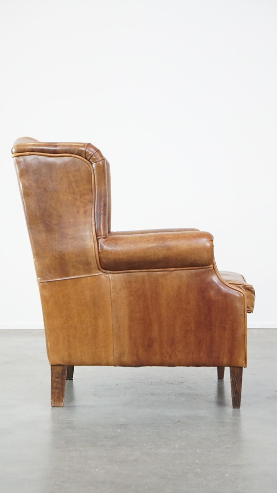 Image 1 of Fauteuil à oreilles en cuir de boeuf