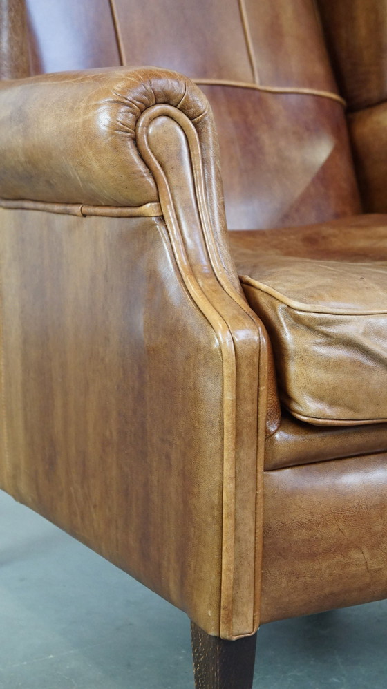 Image 1 of Fauteuil à oreilles en cuir de boeuf