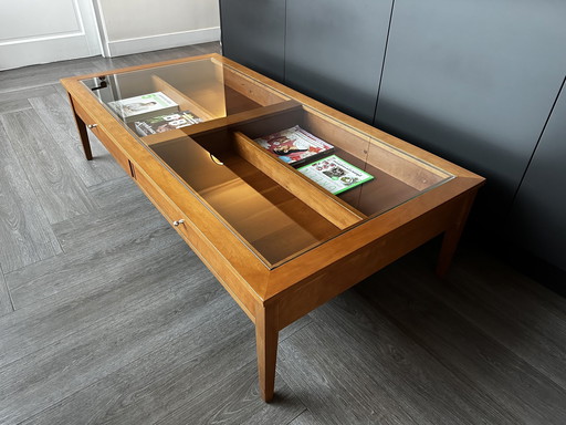 Table basse avec plateau en verre et tiroirs