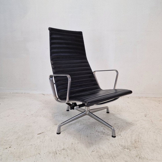 Image 1 of Fauteuil vintage avec ottoman de Charles et Ray Eames en aluminium pour Vitra, 1999