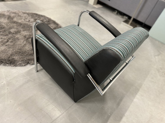 Image 1 of Leolux Scylla Armchair Black Leather Belluno Fabric