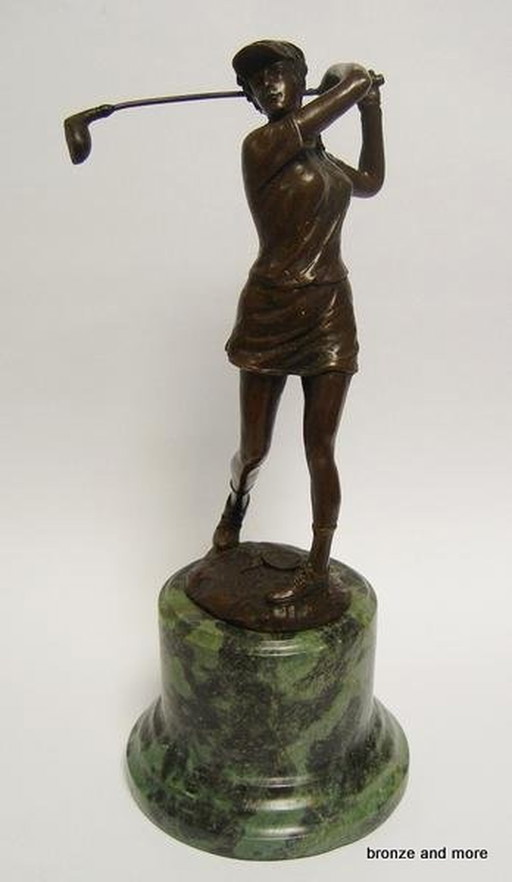 Statue de joueur de golf en bronze