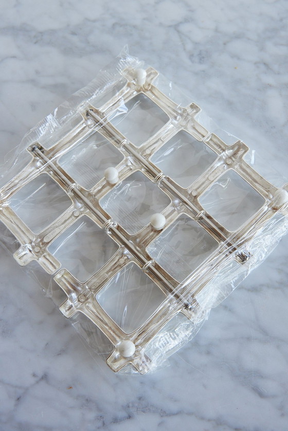 Image 1 of Dessous de plat extensible en faux bambou plaqué argent