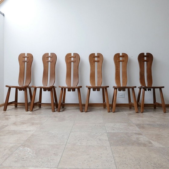 Image 1 of Ensemble de 12 chaises de salle à manger Brutalist en bois de chêne du milieu du siècle par De Puydt, Belgique 1970