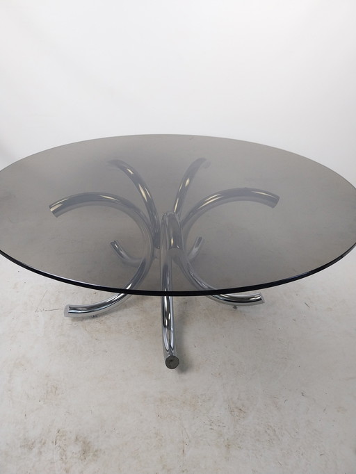 1 X Table basse en acier chromé avec plateau en verre fumé 110Cm.