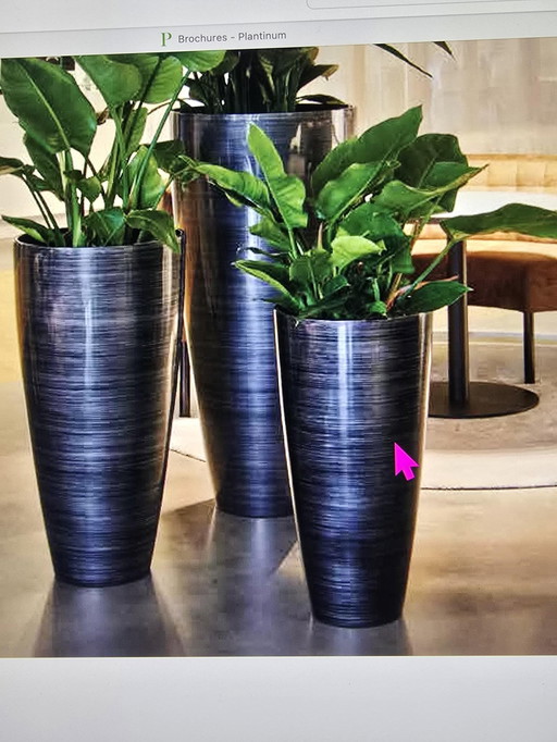 Vase vintage avec plante artificielle