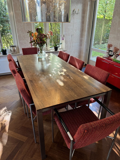 Table de salle à manger extensible Arco en noyer avec pieds en acier inoxydable