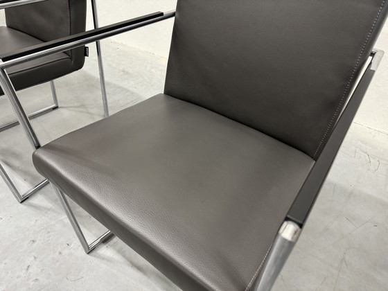 Image 1 of 4 chaises de salle à manger Harvink Dash en cuir gris