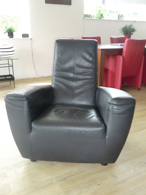 Fauteuil Longa avec étiquette en cuir