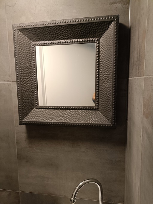 Miroir en métal noir
