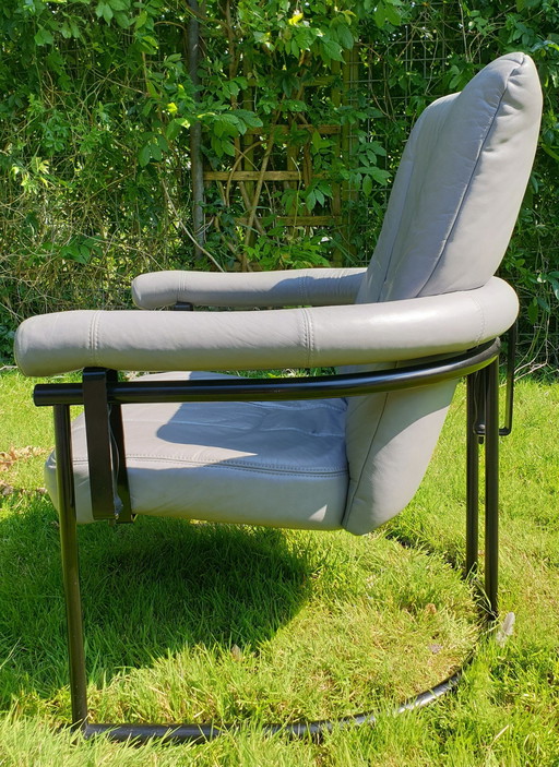 Post Modern Swivel Chair, Black Tubular Frame, Grey Leather, Comfortable