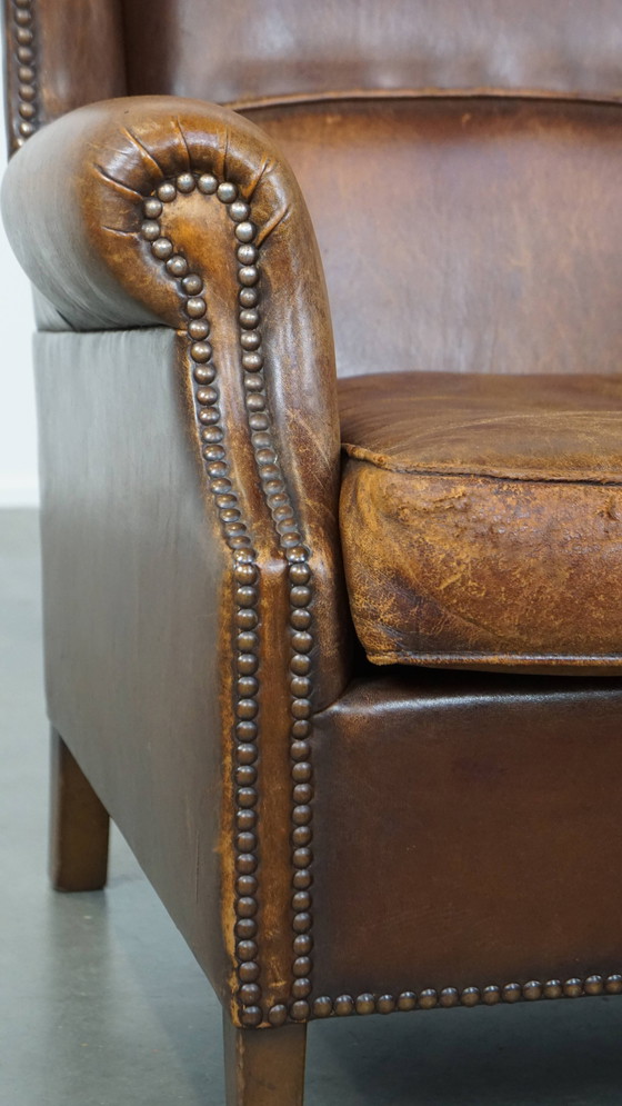 Image 1 of Fauteuil à oreilles en peau de mouton