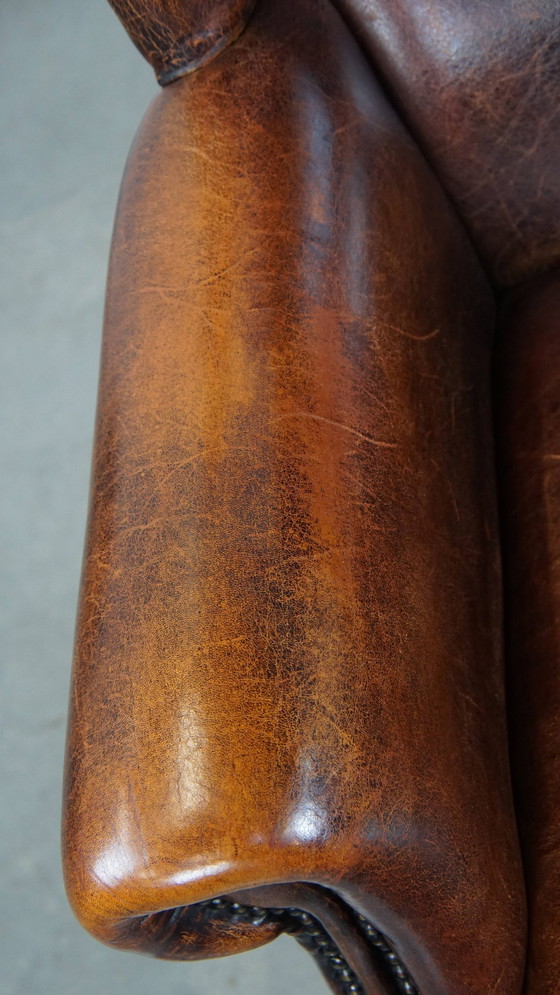 Image 1 of Grand fauteuil vintage à oreilles en cuir de mouton