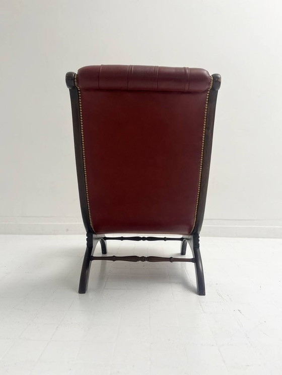 Image 1 of Fauteuil en cuir antique de style Régence