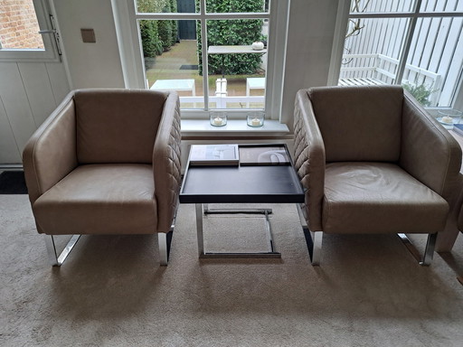 Fauteuils en cuir de designer, marque William Schillig.