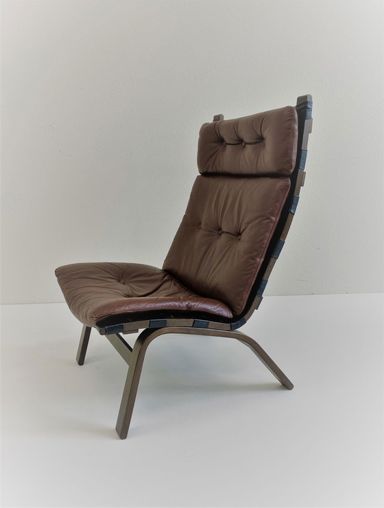 Image 1 of Fauteuil en cuir brun Design danois Farstrup 1972