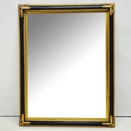 Miroir baroque Xl avec cadre en bois noir et doré