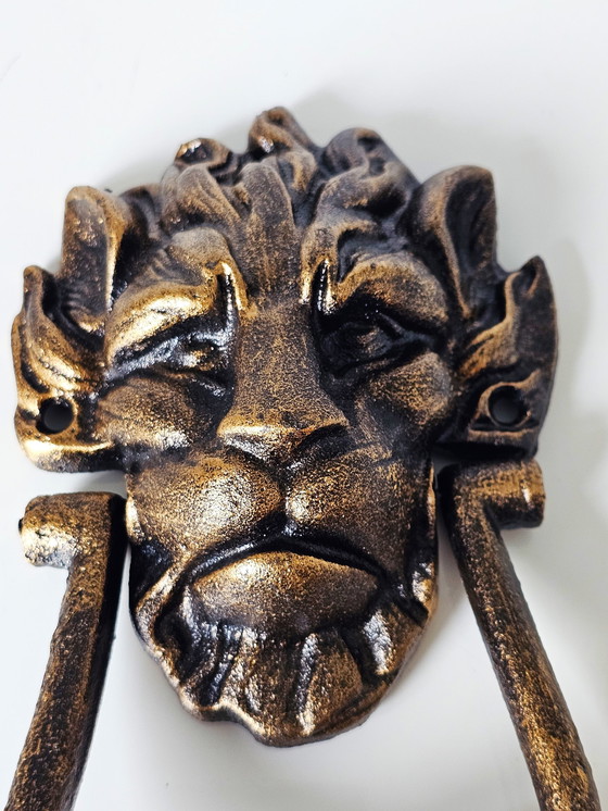 Image 1 of Nouveau heurtoir de porte moderne tête de lion