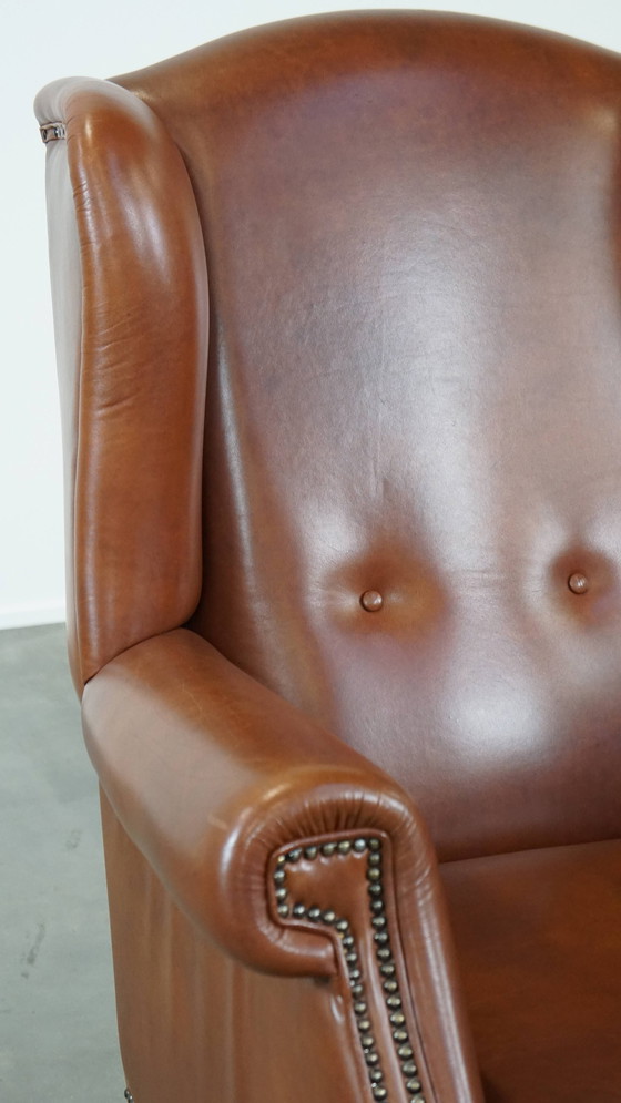 Image 1 of Fauteuil à oreilles en cuir de bœuf