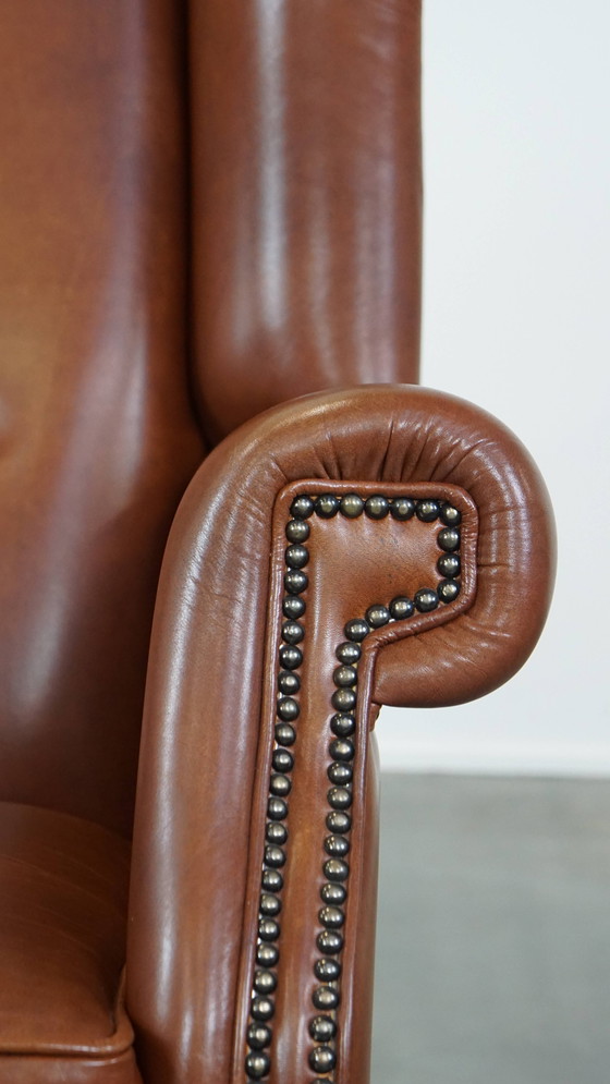 Image 1 of Fauteuil à oreilles en cuir de bœuf