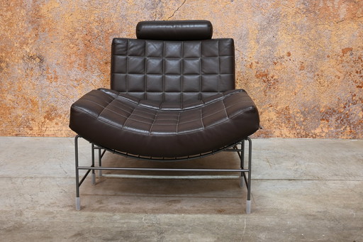 Fauteuil Leolux Volare en cuir brun foncé + Hocker