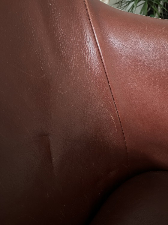 Image 1 of Fauteuil Loge de Montis en cuir brun rouge