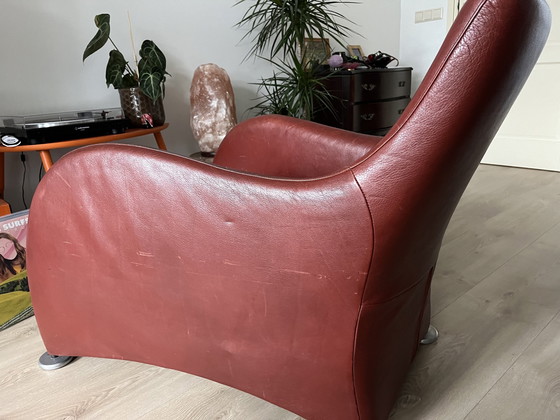 Image 1 of Fauteuil Loge de Montis en cuir brun rouge