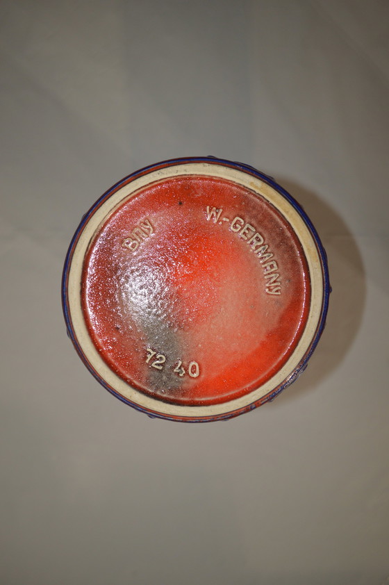 Image 1 of Vase bleu rouge avec motif, de fabrication allemande.