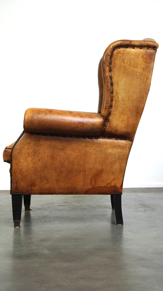 Image 1 of Grand fauteuil à oreilles en cuir de mouton