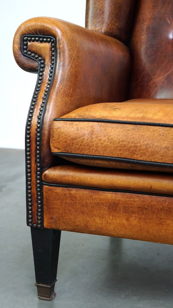 Image 1 of Grand fauteuil à oreilles en cuir de mouton