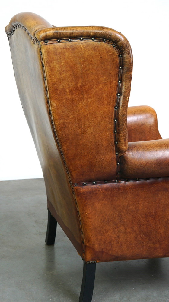 Image 1 of Grand fauteuil à oreilles en cuir de mouton