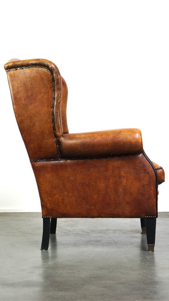 Image 1 of Grand fauteuil à oreilles en cuir de mouton