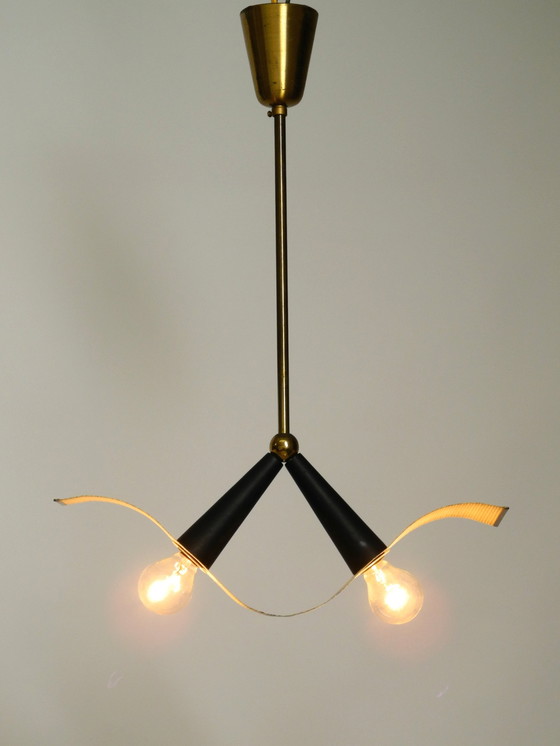 Image 1 of Original Mid Century Brass Ceiling Cone Lamp With A Curved Perforated Sheet Lampshade