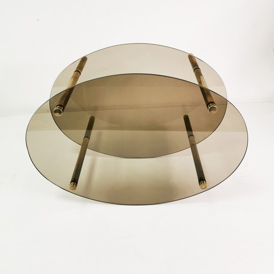 Image 1 of Table basse vintage minimaliste ovale en laiton et verre, Allemagne 1960