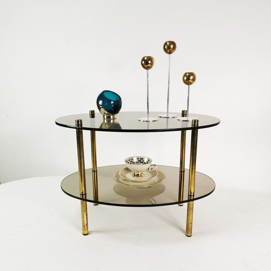 Image 1 of Table basse vintage minimaliste ovale en laiton et verre, Allemagne 1960