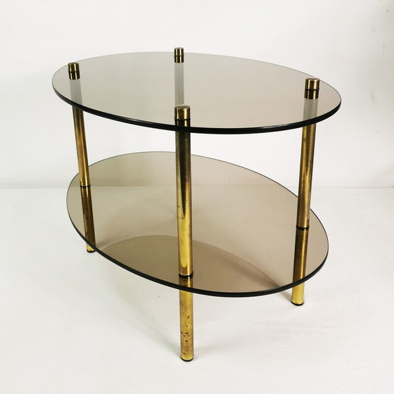 Image 1 of Table basse vintage minimaliste ovale en laiton et verre, Allemagne 1960