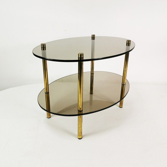 Image 1 of Table basse vintage minimaliste ovale en laiton et verre, Allemagne 1960