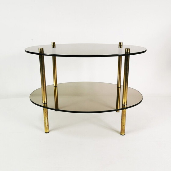 Image 1 of Table basse vintage minimaliste ovale en laiton et verre, Allemagne 1960