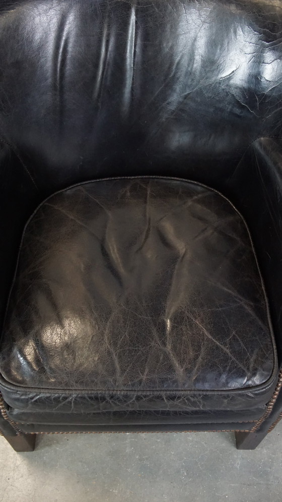 Image 1 of Fauteuil noir avec coussin d'assise réversible en kelim