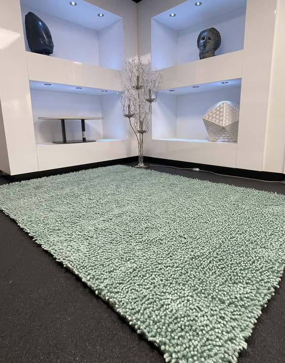 Image 1 of Brink & Campman sur un tapis vert clair