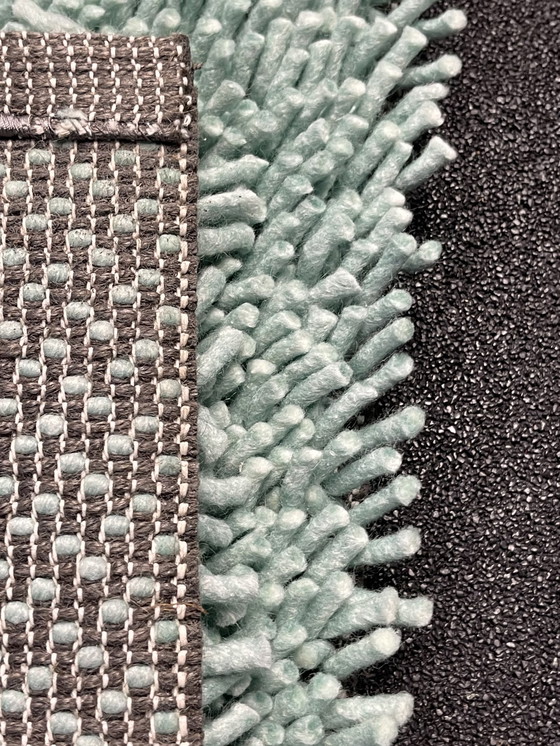 Image 1 of Brink & Campman sur un tapis vert clair