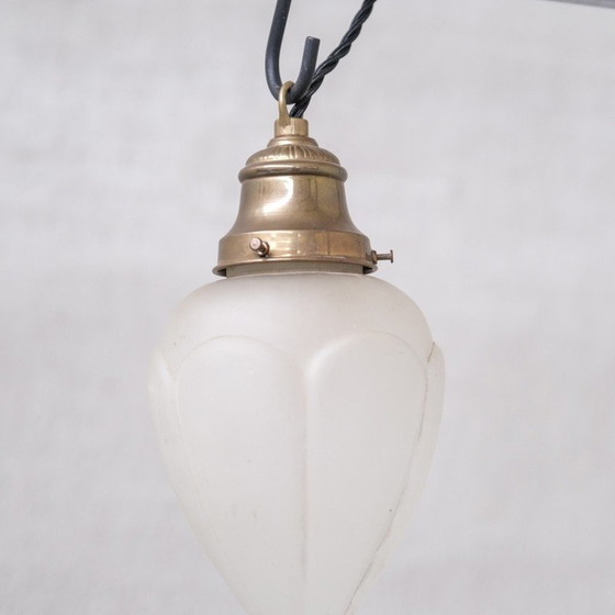 Image 1 of Paire de lampes suspendues en verre opaque et laiton, France 1920