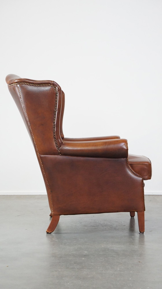 Image 1 of Fauteuil à oreilles en cuir de boeuf